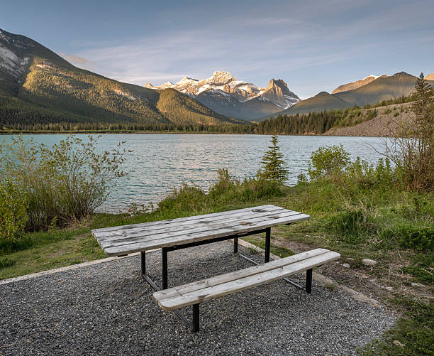 istock Picnic Table with Mount Lougheed and Gap Lake in Bow Valley Provincial Park 2216869392