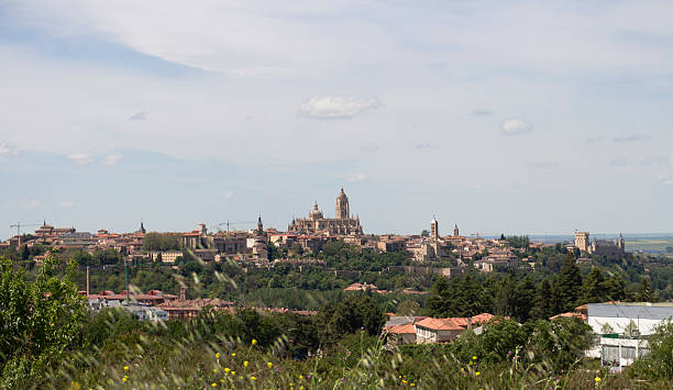 istock Segovia Cathedral rising above the cityscape under cloudy sky in Spring 2216872031