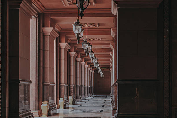 istock Elegant Hallway with Columns and Decorative Lighting 2216879605