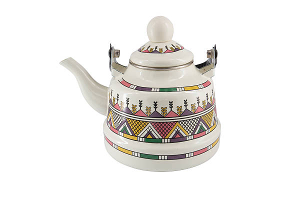 istock Vintage metal old kettle with patterns isolated on white background 2216883446