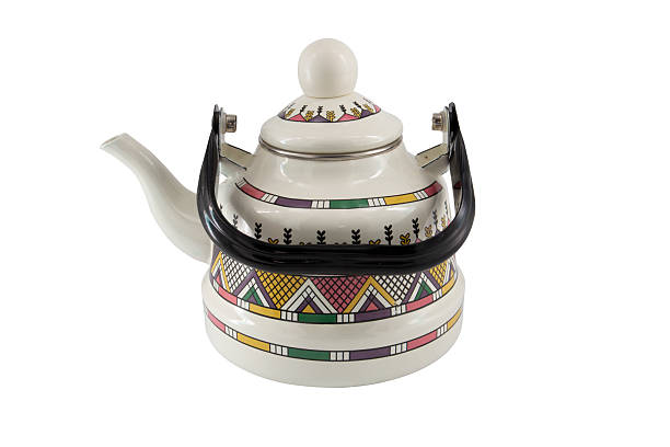 istock Vintage metal old kettle with patterns isolated on white background 2216883501