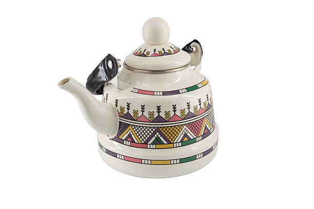 istock Vintage metal old kettle with patterns isolated on white background 2216883503