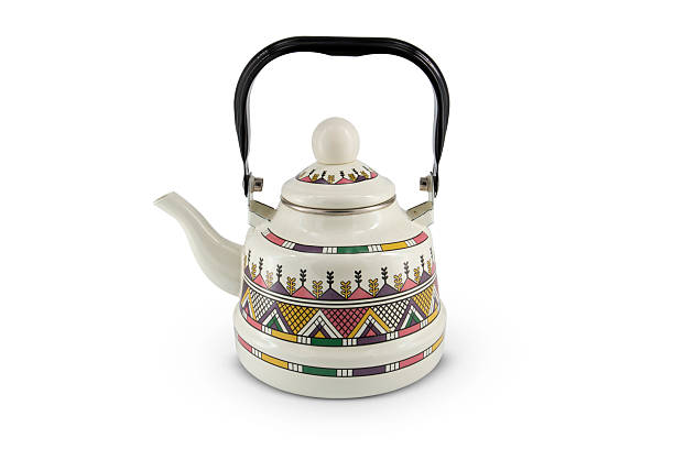 istock Vintage metal old kettle with patterns isolated on white background 2216883551