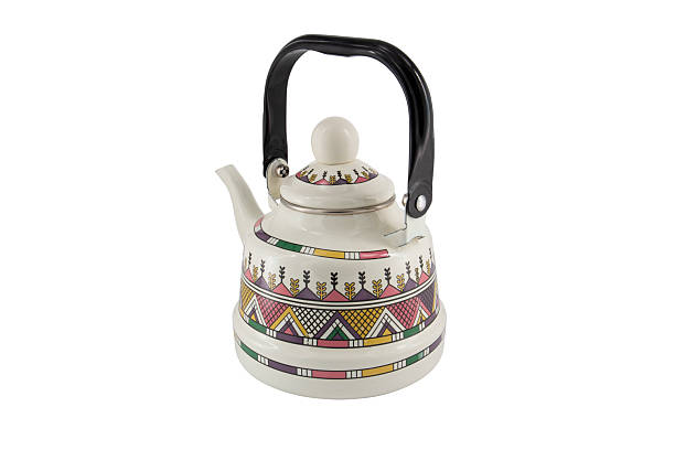 istock Vintage metal old kettle with patterns isolated on white background 2216883582