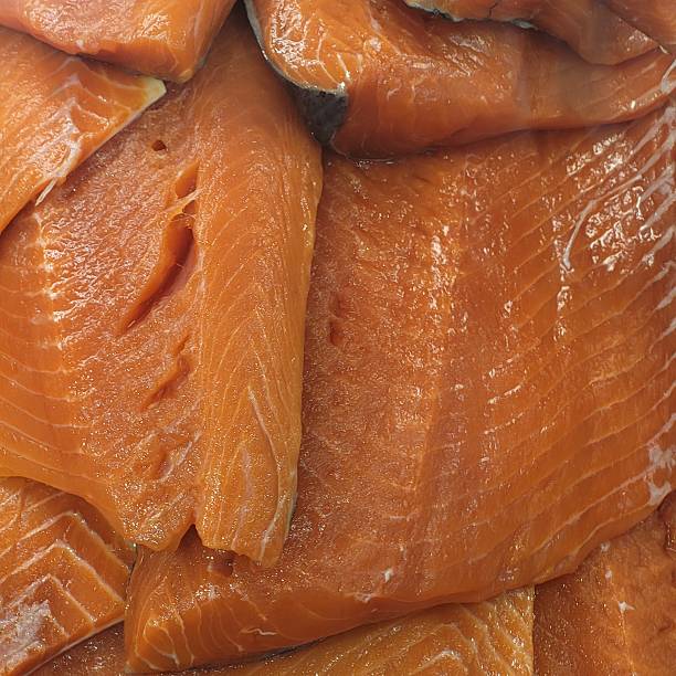 istock Close up view in store:  sliced raw sockeye salmon 2216884699