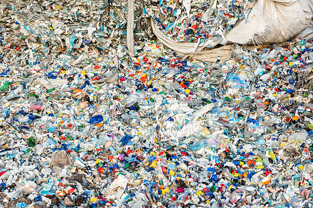 istock Accumulation of Discarded Plastic Waste with Colorful Bottle Caps 2216886283