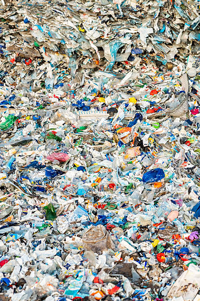 istock Accumulation of Discarded Plastic Waste Including Bottles and Debris 2216886287