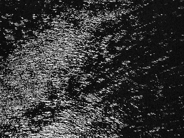 istock Puddle of Water In Rain 2216898245
