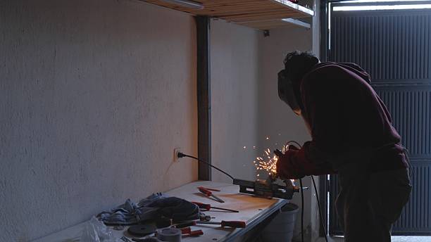 istock Green Economy. Welder Works On Customized Bespoke Design From Metal Scrap 2216901484