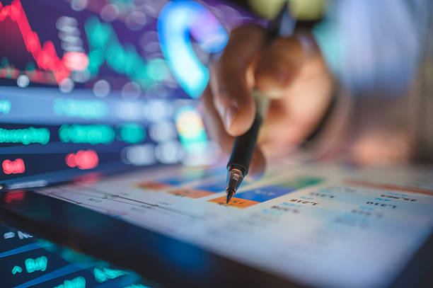 istock fintech user engaging with smartphone and tablet multiple financial dashboards on portable screens simultaneously synchronized trading apps with cryptocurrency analytics 2216912637
