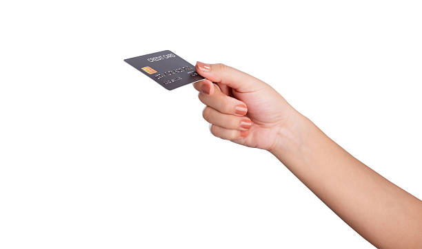 istock Female hand hold credit card isolated on white background, clipping path. 2216915562