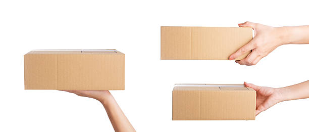 istock Hand holding parcel Box isolated on white background, clipping path. 2216915592