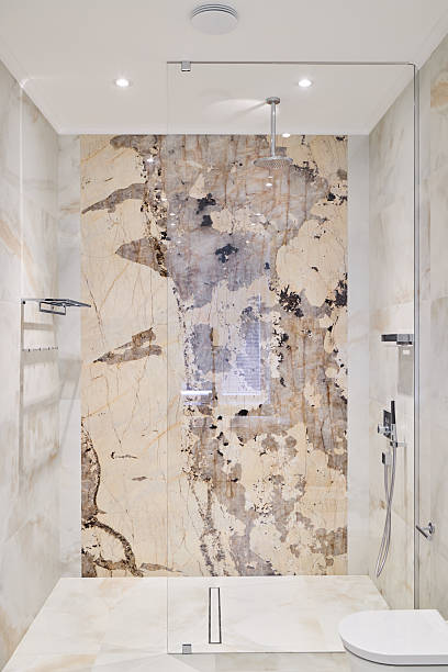 istock Inspiring Modern Bathroom Design Featuring a Stunningly Elegant Stone Wall and a Beautiful Shower 2216922369