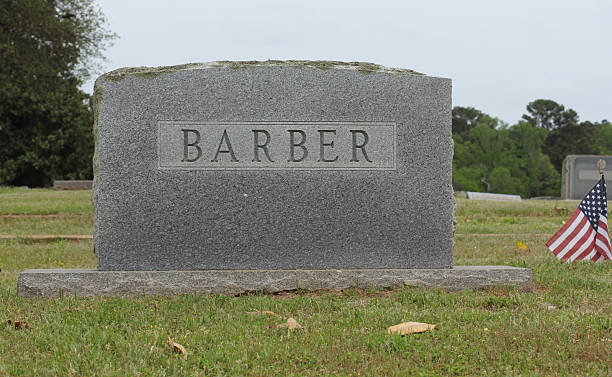 istock Headstone in Cemetery With Word Barber 2216925323