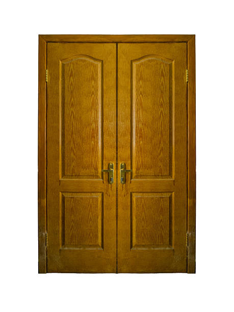 istock Double wooden doors with symmetrical panels and brass handles are isolated. 2216926802