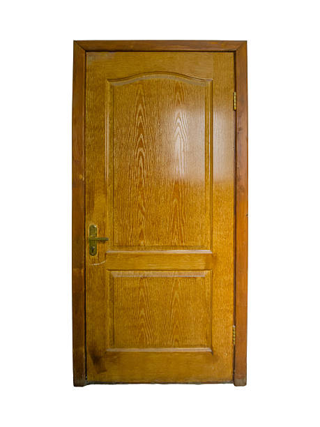 istock Old brown wooden door with rectangular panels and brass handle is isolated. 2216926807