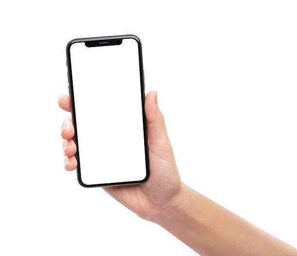 istock Hand holding the black smartphone with blank screen isolated on white background, clipping path. 2216927338