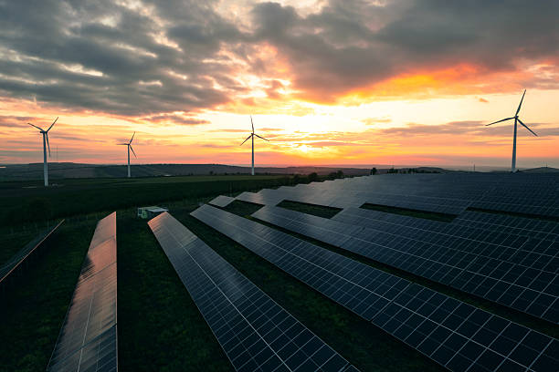 istock Wind turbines and solar parks are two adopted renewable energy technologies used to generate electricity sustainably. Green energy reduces pollution and keeps the environment clean and sustainable. 2216930483