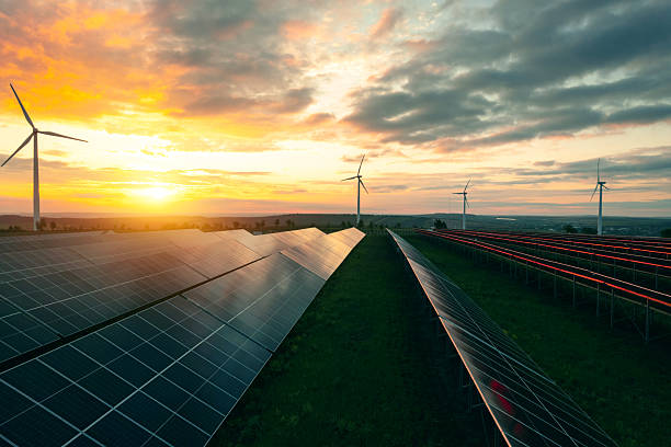 istock Wind turbines and solar parks are two adopted renewable energy technologies used to generate electricity sustainably. Green energy reduces pollution and keeps the environment clean and sustainable. 2216930509