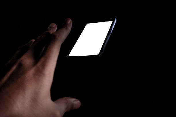 istock Floating Smartphone Above Hand in the Dark, Mysterious Minimalist Concept 2216930644