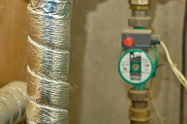 istock Water pipe insulated with metal foil, pressure sensor 2216931145