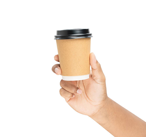istock Clipping path, Hand holding coffee paper cup on isolated background. 2216932113