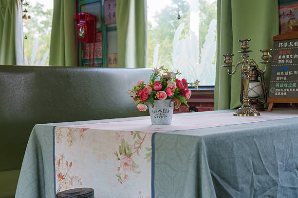 Fake roses in a vase for party table decoration