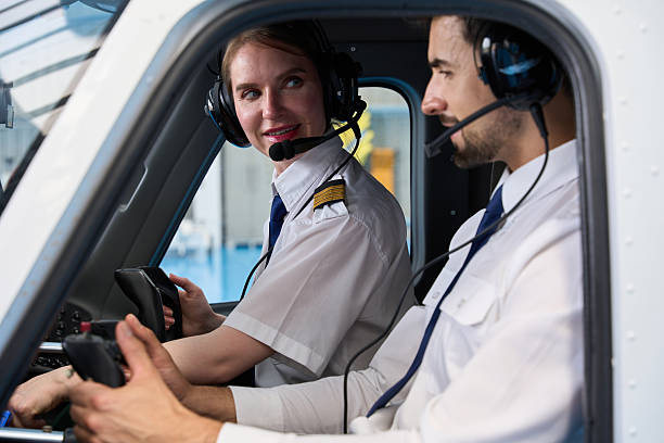 istock Student pilots training in cockpit: practicing takeoff and landing procedures 2216943553