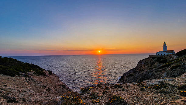 istock Scenic Sunset at Coastal Lighthouse in Mallorca, Spain 2216948551