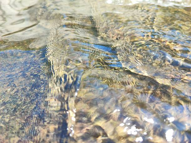 Ripples on the surface of water, in a river, South Wales UK.