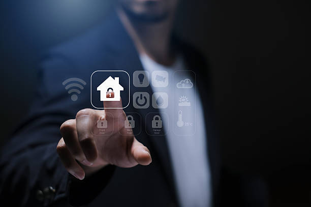 istock Business person using digital dashboard of smart home app for control home appliances. Technology assistant for smart devices, intelligent house or smart home technology. 2216957441