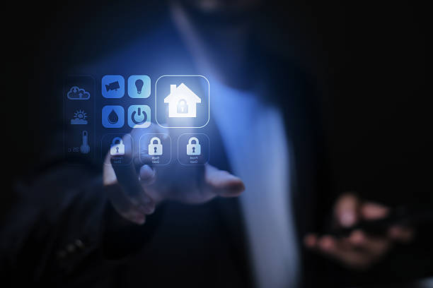 istock Business person using digital dashboard of smart home app for control home appliances. Technology assistant for smart devices, intelligent house or smart home technology. 2216957542