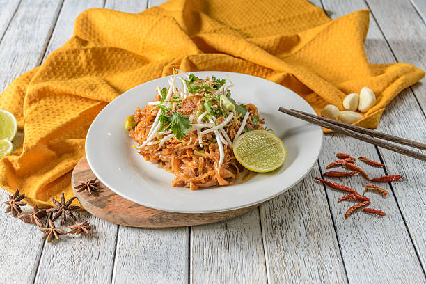 istock Delicious Pad Thai Served on a Rustic Wooden Table 2216961931