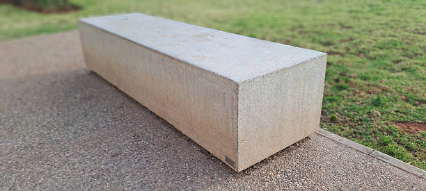 istock Minimalist concrete bench in urban park setting 2216969922