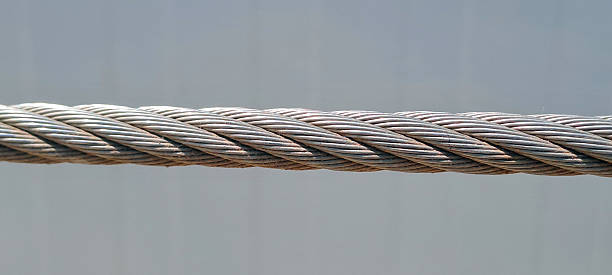 istock Close-up of twisted steel cable texture 2216970007