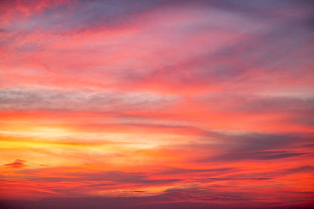 istock Sky,Beautiful sunset view, luxury soft gradient orange gold clouds and sunlight on the blue dramatic sky perfect for the background, morning, evening,Twilight, climate change,horizontal sunset photo 2216970259