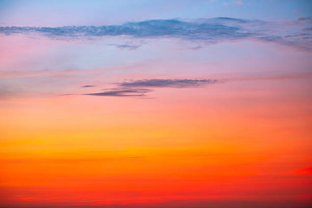 istock Sky,Beautiful sunset view, luxury soft gradient orange gold clouds and sunlight on the blue dramatic sky perfect for the background, morning, evening,Twilight, climate change,horizontal sunset photo 2216970484