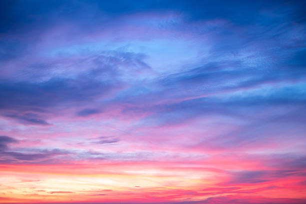 istock Sky,Beautiful sunset view, luxury soft gradient orange gold clouds and sunlight on the blue dramatic sky perfect for the background, morning, evening,Twilight, climate change,horizontal sunset photo 2216970994