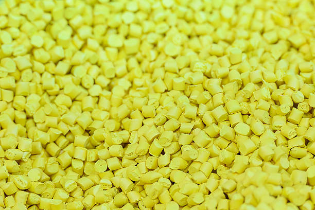 istock The pile of yellow pellets materials for plastic injection process. 2216972636