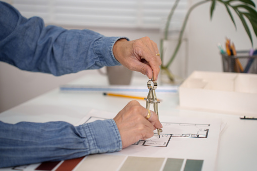 Hand Drafting Process Architect Hand Drafting Blueprint With Compass For House Interior ...