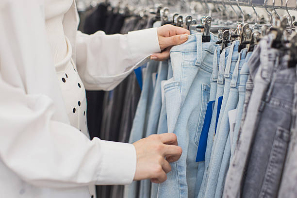 istock Woman choosing jeans 2216974791