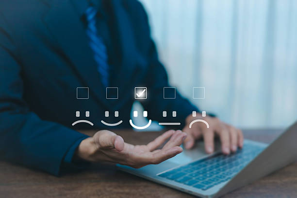 istock Customer satisfaction survey concept. User give five-star rating to service experience, Businessman uses laptop and gives 5 star review show smile icon on hand, customer, satisfaction, user 2216975689