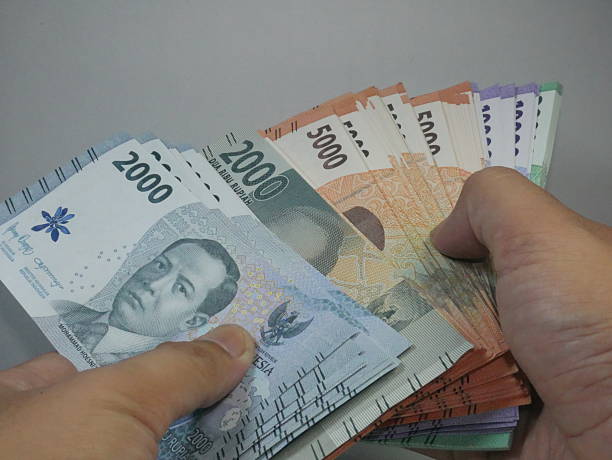 istock displaying different denominations of rupiah 2216978223