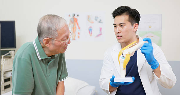 istock asian elderly knee health consult 2216981385