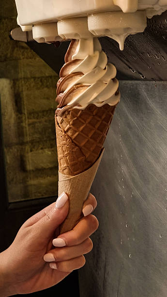 istock ice cream making fresh hand swirl cone 2216984518