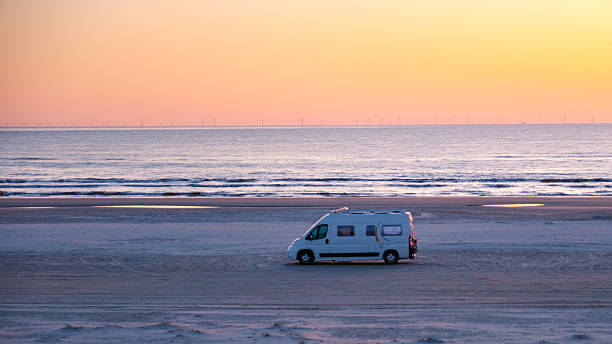 istock Sunset serenity at a Danish beach with a camper van along the tranquil shoreline 2216988507