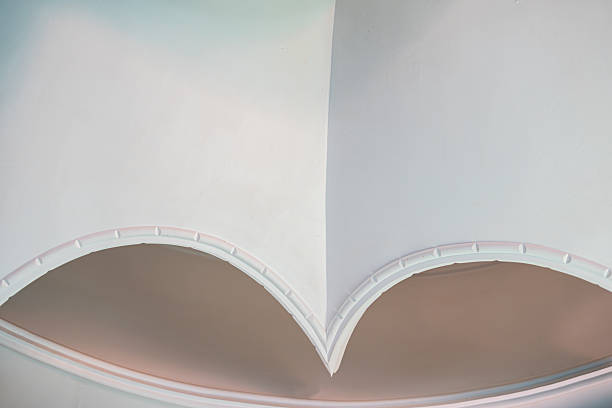 istock Abstract View of Curved White Wall Molding with Soft Light 2216990991