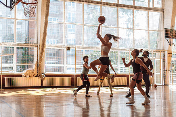Female Athletic Basketball Team Training Indoors