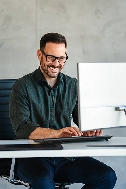 istock Success young professional businessman investor,manager at workplace working on computer in office 2216996521