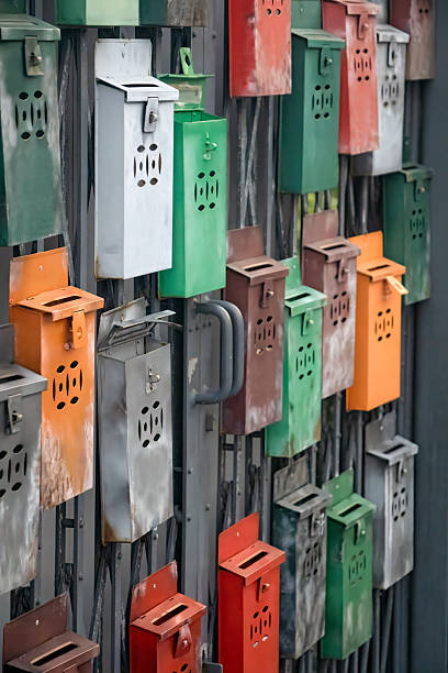 A photo of colorful old mailboxes.